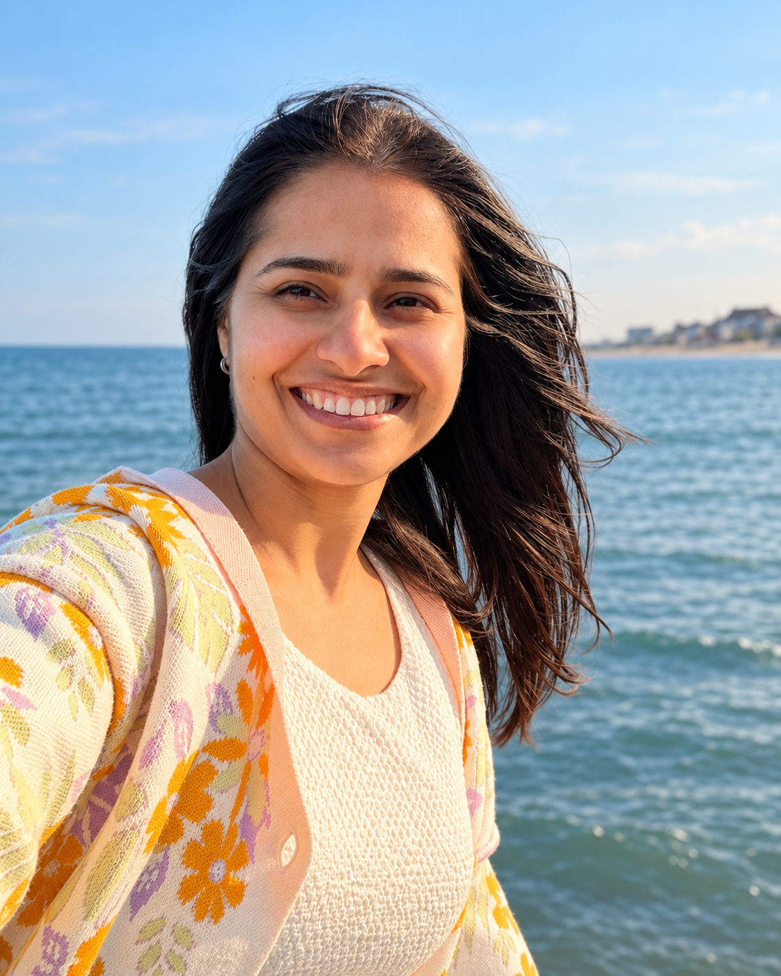 Mamta Lamba smiling by the sea